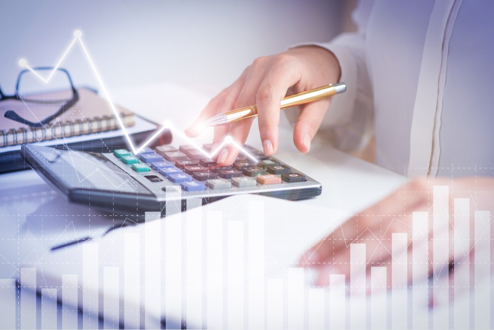 accountant-calculating-profit-with-financial-analysis-graphs